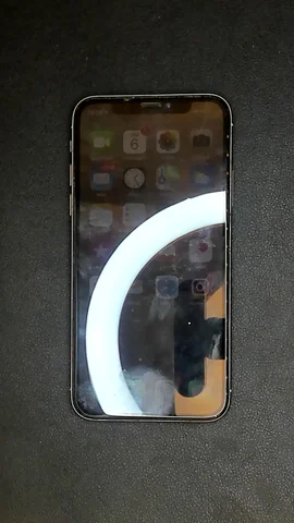 Apple iPhone X de R*****o antes de la reparación de puerto de carga