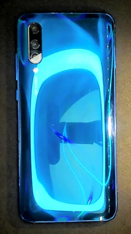 Foto tomada del Xiaomi Mi 9 Lite de I*****o posterior a la reparación de pantalla y tapa trasera el 20 de Diciembre de 2021