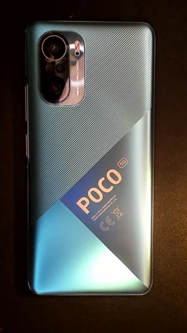 Xiaomi Poco F3 de A*****m antes de la reparación de lente de cámara trasera