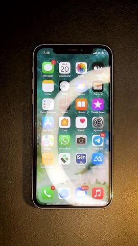 Apple iPhone X de A*****o antes de la reparación de auricular