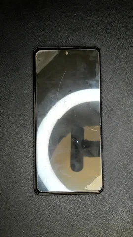 Samsung Galaxy A51 de J***s antes de la reparación de puerto de carga y micrófono