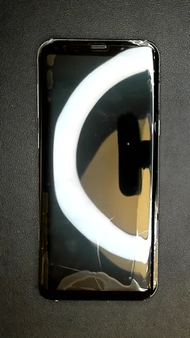 Samsung Galaxy S8+ de J**n antes de la reparación de puerto de carga y micrófono