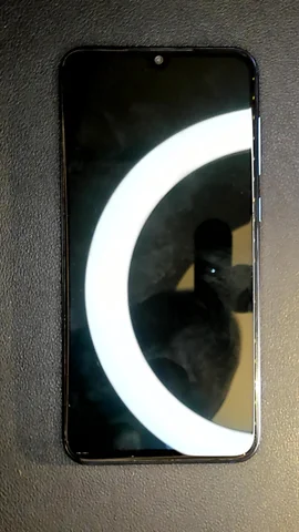 Xiaomi Mi 9 SE de P***a antes de la reparación de pantalla