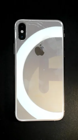 Apple iPhone XS de C********a antes de la reparación de pantalla y tapa trasera