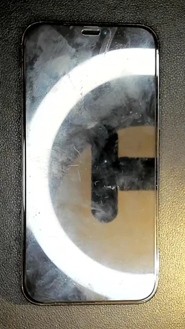 Apple iPhone 12 Pro de J**é antes de la reparación de puerto de carga