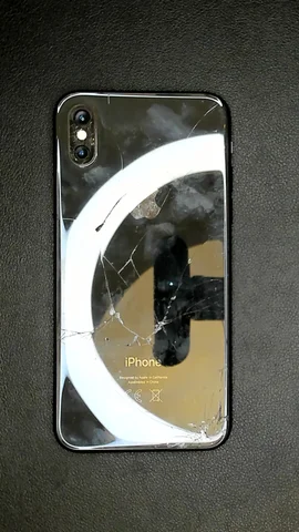 Apple iPhone XS de R****l antes de la reparación de pantalla y cámara trasera y lente de cámara trasera