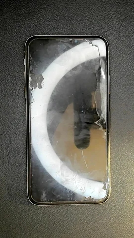 Apple iPhone X de A*****n antes de la reparación de auricular