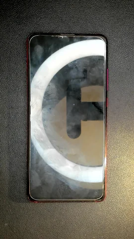 Xiaomi Mi 9T de A*a antes de la reparación de auricular