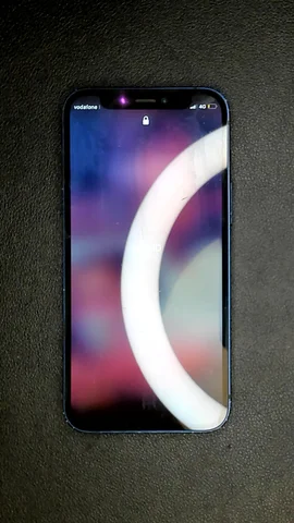 Foto tomada del Apple iPhone 12 mini de J**e posterior a la reparación de puerto de carga el 19 de Mayo de 2023