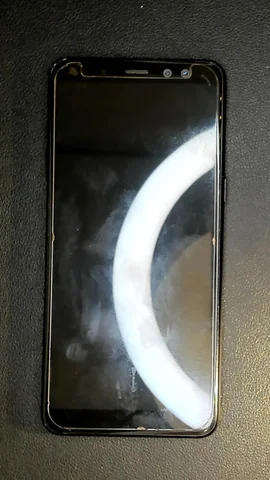 Samsung Galaxy A8 (2018) de E*****a antes de la reparación de batería