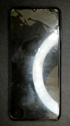 Samsung Galaxy A70 de J**n antes de la reparación de puerto de carga