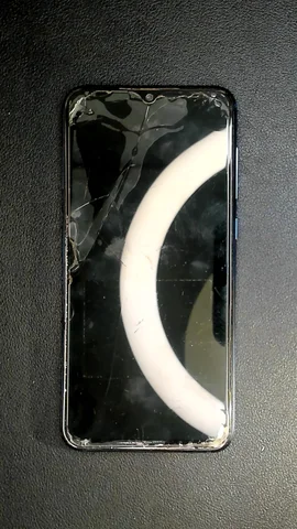 Xiaomi Mi 9 SE de J**é antes de la reparación de pantalla