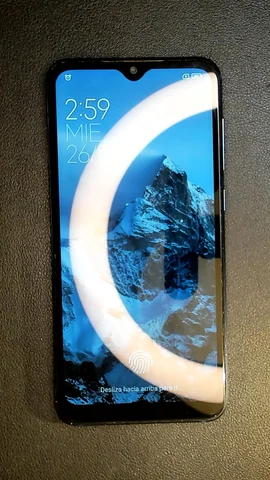 Foto tomada del Xiaomi Mi 9 SE de J**é posterior a la reparación de pantalla el 30 de Octubre de 2023