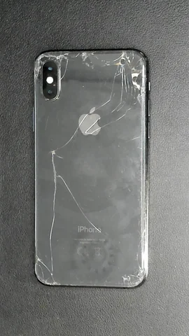 Apple iPhone XS de J**é antes de la reparación de batería y tapa trasera y pantalla