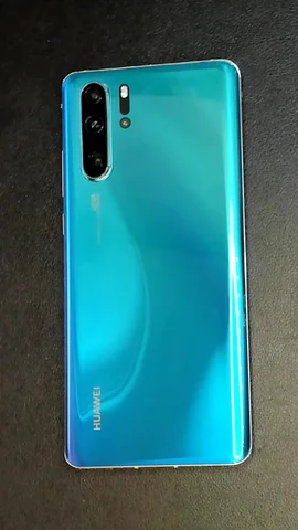 Foto tomada del Huawei P30 Pro de A*****o posterior a la reparación de pantalla y tapa trasera el 22 de Diciembre de 2023