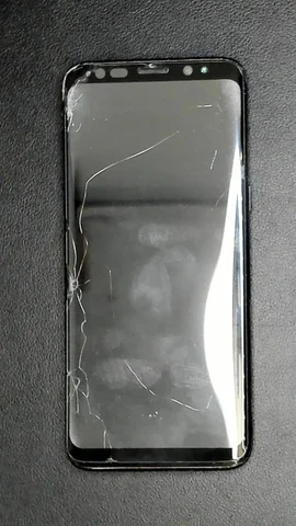 Samsung Galaxy S8 de J**é antes de la reparación de puerto de carga