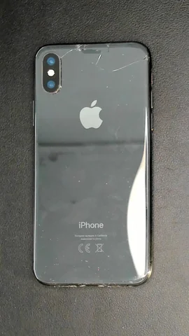 Apple iPhone XS de E*******a antes de la reparación de cámara trasera