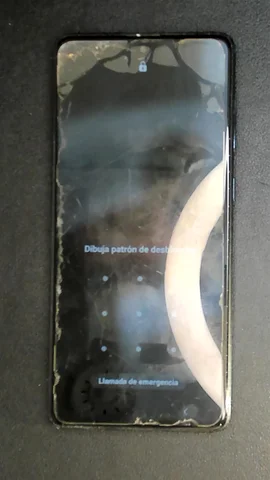 Samsung Galaxy A71 de M***a antes de la reparación de puerto de carga y micrófono