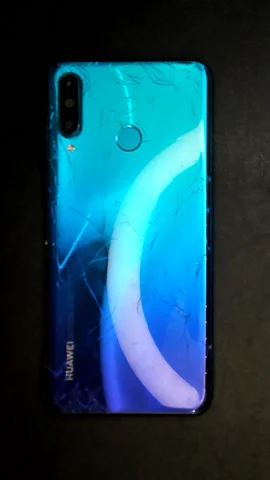 Huawei P30 lite de J**n antes de la reparación de pantalla y tapa trasera