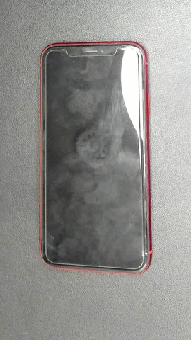 Apple iPhone XR de F*******o antes de la reparación de puerto de carga y micrófono