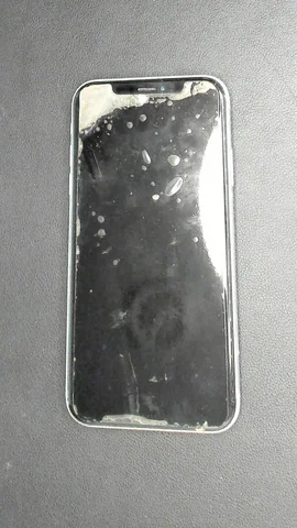 Apple iPhone XR de E*y antes de la reparación de puerto de carga y micrófono