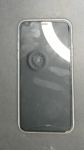Apple iPhone XR de C****n antes de la reparación de puerto de carga