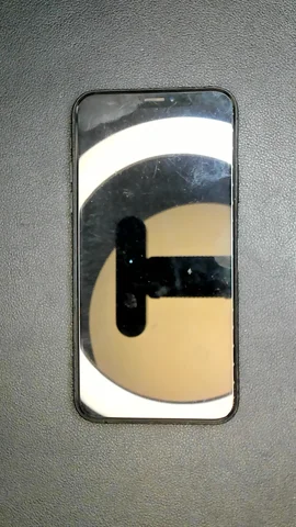 Apple iPhone XS de E****o antes de la reparación de batería