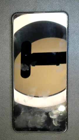 Samsung Galaxy A21s de T***s antes de la reparación de puerto de carga y micrófono