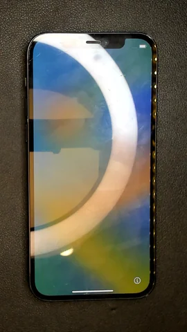 Apple iPhone 12 de A*******o antes de la reparación de puerto de carga