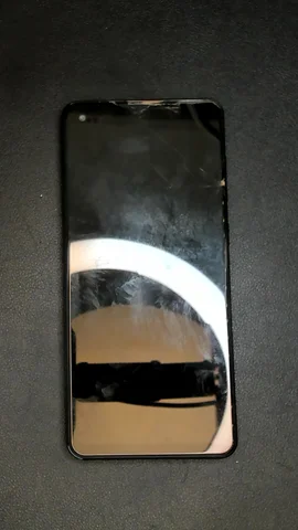 Samsung Galaxy A21s de J**e antes de la reparación de puerto de carga y micrófono